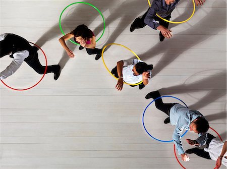 Men and women with hula hoops Foto de stock - Sin royalties Premium, Código: 649-03446910