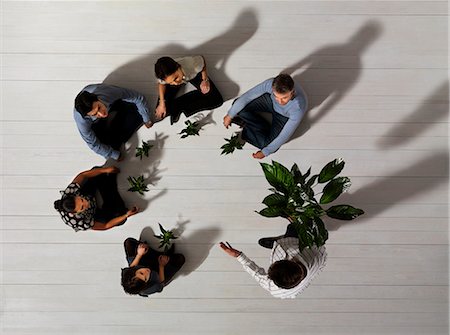 plant meeting - Group of people on floor with plants Stock Photo - Premium Royalty-Free, Code: 649-03446925