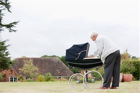 simsearch:649-02198842,k - Grandfather looking at baby in pram Stock Photo - Premium Royalty-Free, Code: 649-03447763