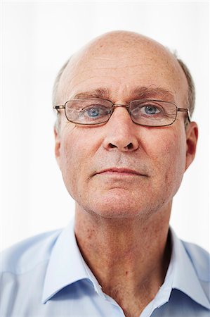Portrait of a man in glasses Stock Photo - Premium Royalty-Free, Code: 649-03448365