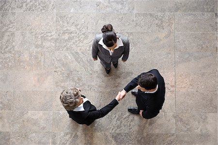 simsearch:632-06404698,k - Business people shaking hands Stock Photo - Premium Royalty-Free, Code: 649-03465549