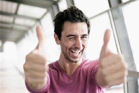 simsearch:649-06000756,k - Man giving two thumbs up Stock Photo - Premium Royalty-Free, Code: 649-03465590