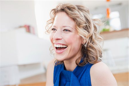 ease - Woman laughing Stock Photo - Premium Royalty-Free, Code: 649-03487013