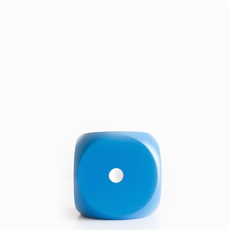 A dice with one showing Stock Photo - Premium Royalty-Free, Code: 649-03510904
