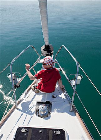 ship bow - Boy on yacht Stock Photo - Premium Royalty-Free, Code: 649-03510949