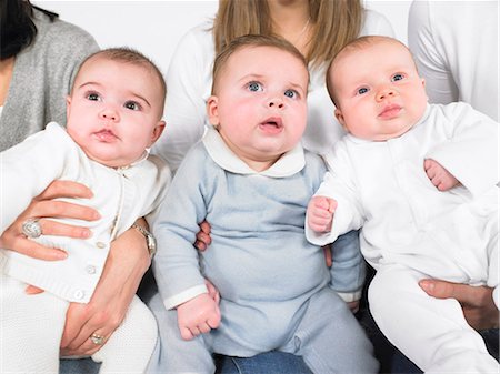 diverse group of friends - Three babies with mothers Stock Photo - Premium Royalty-Free, Code: 649-03511216