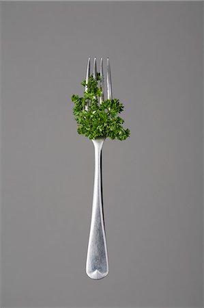 Fork with parsley Stock Photo - Premium Royalty-Free, Code: 649-03566435