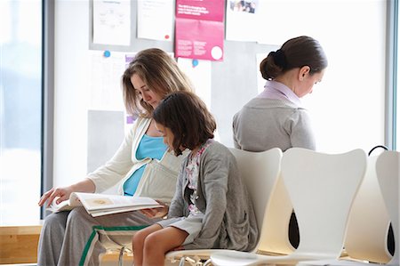 pregnant mother and child - Mother and child in doctor waiting room Stock Photo - Premium Royalty-Free, Code: 649-03566538