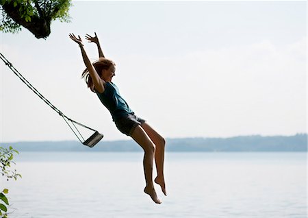 falling - Girl jumping from swing Stock Photo - Premium Royalty-Free, Code: 649-03606364