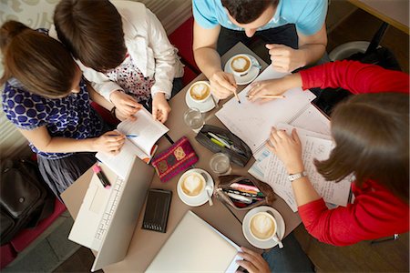 people busy viewed from above - Students studying in a cafe Stock Photo - Premium Royalty-Free, Code: 649-03606403