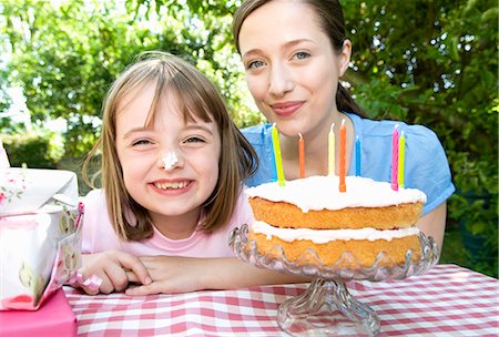 Happy little girl at birthday party Stock Photo - Premium Royalty-Free, Code: 649-03606663