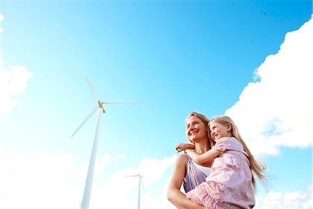 family electricity - Mother and daughter at wind turbine Stock Photo - Premium Royalty-Free, Code: 649-03621516