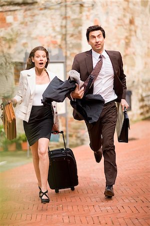 running suitcase - Business Toscana Stock Photo - Premium Royalty-Free, Code: 649-03621684