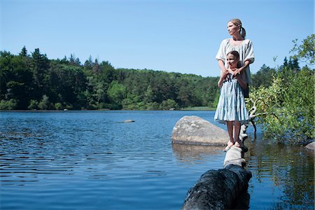 Woman and daughter by a lake Stock Photo - Premium Royalty-Free, Code: 649-03622270