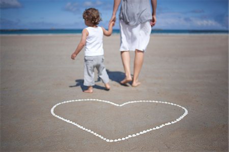 family activity lifestyle - Woman and son in front on the beach Stock Photo - Premium Royalty-Free, Code: 649-03622291