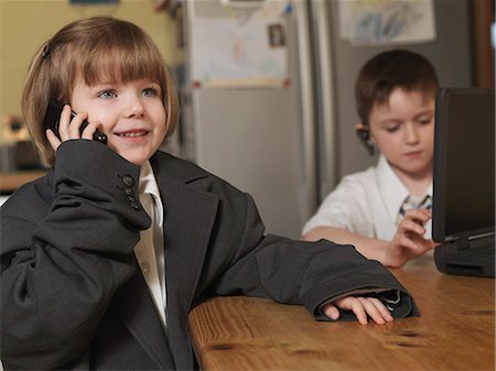 children dressed as business people Foto de stock - Sin royalties Premium, Código: 649-03666232