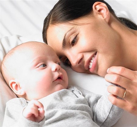 pictures of baby face side profile - Mother with her baby-boy, smiling Stock Photo - Premium Royalty-Free, Code: 649-03666338