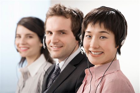 A line of telephone operators Stock Photo - Premium Royalty-Free, Code: 649-03666548