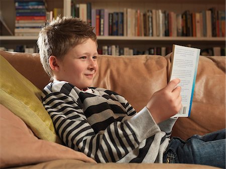 Boy, 11 reading Stock Photo - Premium Royalty-Free, Code: 649-03667137