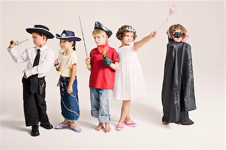 party silhouetted - party kids in costume Stock Photo - Premium Royalty-Free, Code: 649-03667241