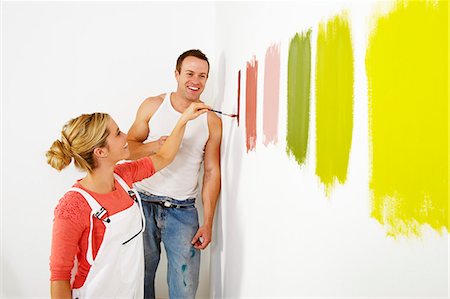 simsearch:649-02665672,k - Woman painting colour swatches on wall Fotografie stock - Premium Royalty-Free, Codice: 649-03667425