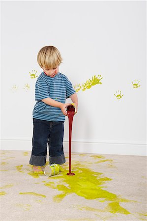 simsearch:649-03667434,k - Toddler boy pouring paint onto carpet Stock Photo - Premium Royalty-Free, Code: 649-03667436