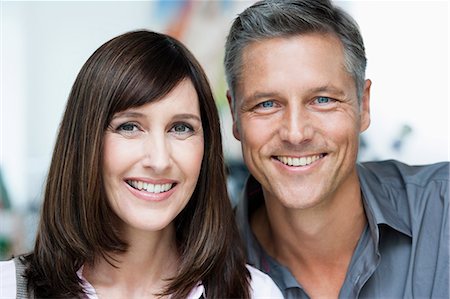 simsearch:614-08868084,k - Colleagues smiling to camera portrait Stock Photo - Premium Royalty-Free, Code: 649-03769155