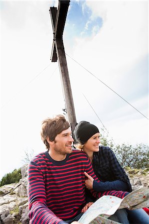 Couple with map sitting under cross Stock Photo - Premium Royalty-Free, Code: 649-03769190