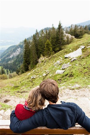 european bench - Couple sitting on bench hugging Stock Photo - Premium Royalty-Free, Code: 649-03769213