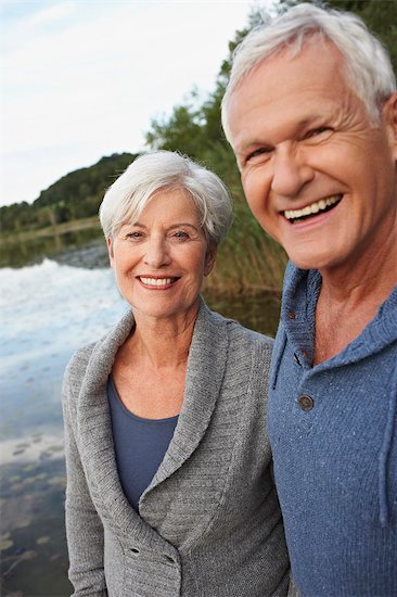 Senior couple in front of lake Stock Photo - Premium Royalty-Free, Image code: 649-03769283