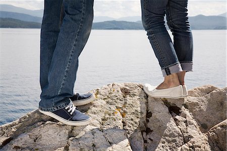 simsearch:649-03771106,k - Man and woman standing on rock by sea Stock Photo - Premium Royalty-Free, Code: 649-03769642