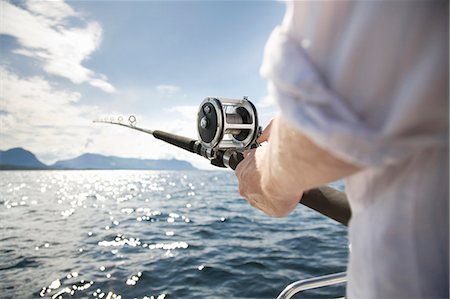 pleasure boat - Man fishing in sea Stock Photo - Premium Royalty-Free, Code: 649-03769665