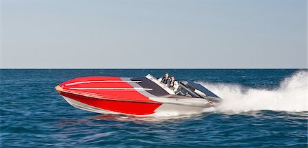 fun adult race - Powerboat racing at high speed Stock Photo - Premium Royalty-Free, Code: 649-03774124