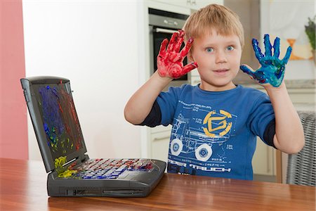 paint messy - Boy showing dirty hands Stock Photo - Premium Royalty-Free, Code: 649-03774403