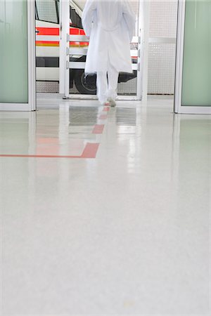 picture male nurse - Doctors back rushing through hall Stock Photo - Premium Royalty-Free, Code: 649-03774429