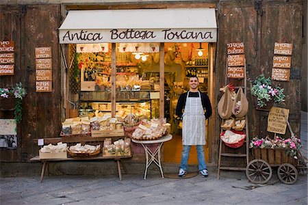 supermarket outside - Owner standing in front of deli Stock Photo - Premium Royalty-Free, Code: 649-03774769