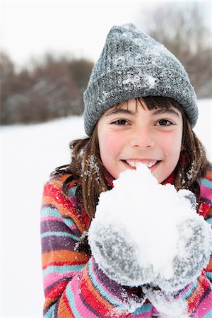 deutschland winter - Girl holding snow in her hands Stock Photo - Premium Royalty-Free, Code: 649-03774898