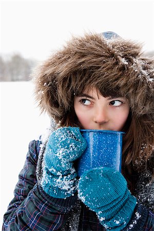 drinking outdoor winter - Girl sipping hot drink Stock Photo - Premium Royalty-Free, Code: 649-03774907