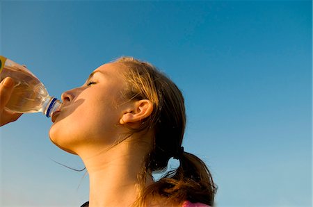Female hiker drinks water Stock Photo - Premium Royalty-Free, Code: 649-03770595
