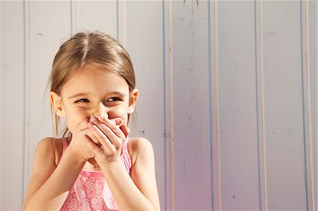 Little Girl giggling Stock Photo - Premium Royalty-Free, Code: 649-03770679