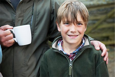 enjoying coffee together - Father and son having tea Stock Photo - Premium Royalty-Free, Code: 649-03770844