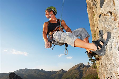 rock climbing hanging - Climbing Stock Photo - Premium Royalty-Free, Code: 649-03770967