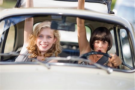 friends driving in car - Woman in a car Stock Photo - Premium Royalty-Free, Code: 649-03771066