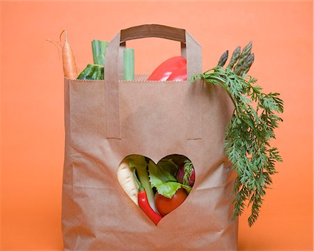 Vegetables in bag with heart symbol Stock Photo - Premium Royalty-Free, Code: 649-03771707