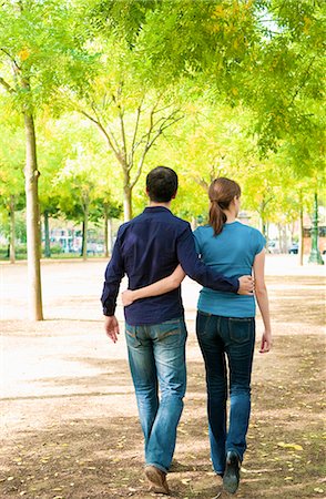 paris outdoors copy space - Romantic couple walk thru Paris park Stock Photo - Premium Royalty-Free, Code: 649-03772240