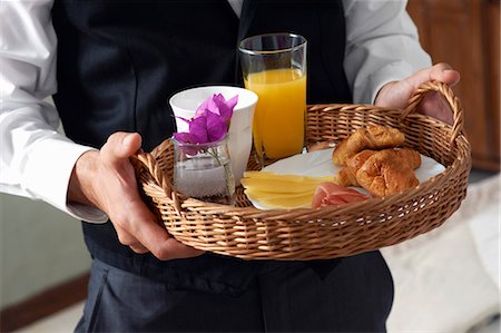 Waiter with breakfast tray Foto de stock - Sin royalties Premium, Código: 649-03772739