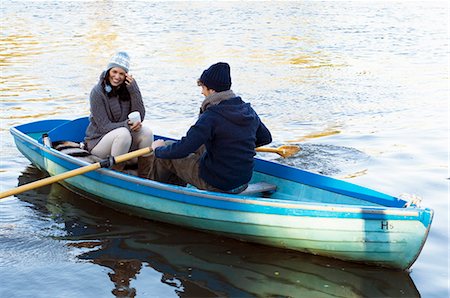 Couple in row boat having fun Foto de stock - Sin royalties Premium, Código: 649-03773410