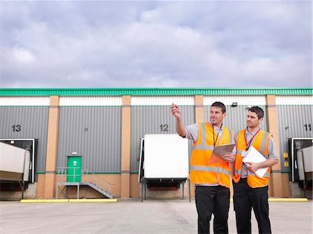Workers in truck loading bay Stock Photo - Premium Royalty-Free, Code: 649-03773439