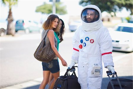 friends sidewalk walk - Astronaut after work Stock Photo - Premium Royalty-Free, Code: 649-03796190