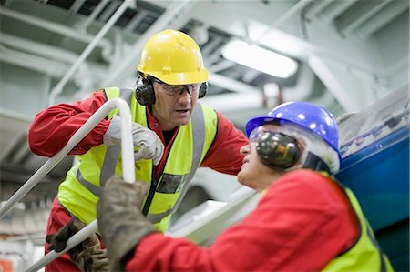 protective workwear - 2 workers in engine room Stock Photo - Premium Royalty-Free, Code: 649-03796346